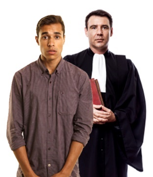 A man standing with a lawyer behind him.